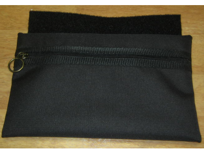 Single pocket under chair bag. Attached under the cushion with Velcro.